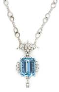 A Platinum Aquamarine and Diamond Pendant