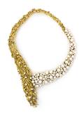 An 18 Karat Gold Cultured Pearl and Diamond Vine Motif Necklace