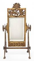 An Aesthetic Style Diminutive Brass Cheval Mirror
