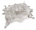 A Continental Silvered Metal Trivet