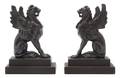A Pair of Cast Iron Figures of Griffins