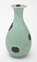 A Japanese Ceramic Baluster Vase