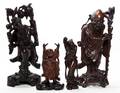 A Group of Four Chinese Carved Wood Figures
