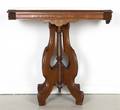 A Victorian Walnut Occasional Table