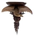 A Carved Wood Parcel Gilt Figural Bracket