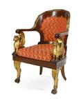 An Empire Style Mahogany and Parcel Gilt Fauteuil