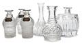 A Collection of Six Cut Glass Decanters