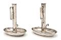 A Pair of Silver PushUp Chambersticks