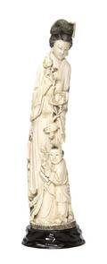 An Ivory Carving of a Lady and Child