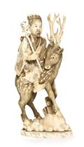 An Ivory Carving of a Man Riding a Stag