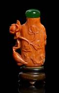 A Carved Coral Snuff Bottle