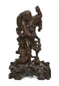 A Chinese Hard Wood Figural Carving