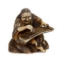 An Ivory Netsuke of a Figure with a Koto Harp
