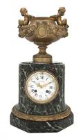 A French Gilt Bronze and Marble Pedestal Clock Delafontaine
