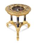 A Napoleon III Gilt Metal Mounted and Porcelain Inset Gueridon