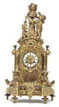 A French Gilt Bronze Figural Mantel Clock