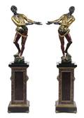 A Pair of Venetian Gilt and Polychrome Decorated Blackamoors