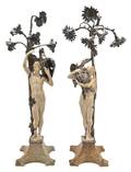 A Pair of Continental Ivory and Silvered Bronze Figural Lamps in the manner of Rombaux and Hoosemans