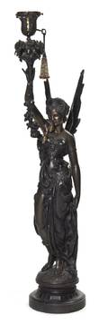 A Cast Metal Figural Torchiere