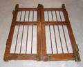 A Teak and Iron Double Door Dog Gate