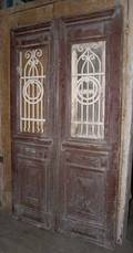 A French Colonial Painted Pine and Iron Double Door