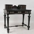 A French Napoleon III Ivory Inlaid Ebonized Bonheur du Jour Desk