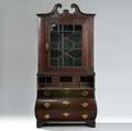 A Dutch Mahogany Bomb Secretaire Bookcase