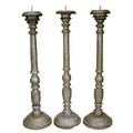 A Set of 3 IndoPortuguese Silver Painted Teak Candlesticks