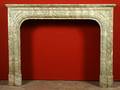 A French Louis XIV Style Cippolino Stone Fireplace Surround