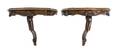 A Pair of Continental Carved Walnut Wall Brackets