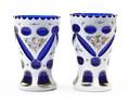 A Pair of Bohemian Enameled Overlay Beakers
