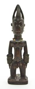 A Yoruba Carved Wooden Figure