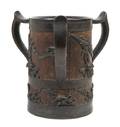 An English Arts and Crafts MetalMounted Oak ThreeHandled Trophy Cup
