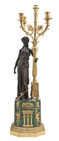 An Empire Patinated Gilt Bronze and Malachite Veneered FiveLight Figural Candelabrum
