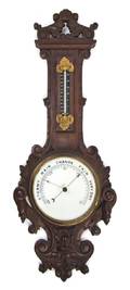 An American Carved Oak Wheel BarometerThermometer