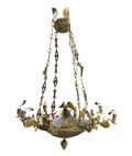 An Empire Style Gilt Bronze and Tole EightLight Chandelier