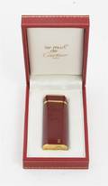A French Lacquer and Gold Plated Cigarette Lighter les Must de Cartier