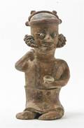 A PreColumbian Style Pottery Figure