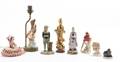 A Collection of Fourteen Porcelain Figures