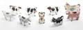 A Collection of Nineteen Ceramic Cow Form Creamers