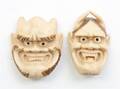 Two Ivory Oni Mask Netsukes