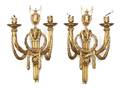 A Pair of Louis XVI Style Gilt Bronze TwoLight Sconces