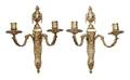 A Pair of Louis XVI Style Gilt Bronze TwoLight Sconces