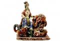 149 Carved Wood and Painted Asian Figure on Foo Dog