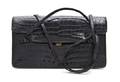 A Judith Leiber Black Crocodile Bag