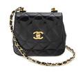 A Chanel Black Quilted Patent Leather Bag