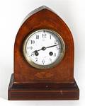 A Victorian Ebonized Wood Mantel Clock