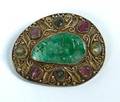 A Jadeite and Silver Wirework Brooch