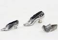212 Three Silver Miniature Shoes