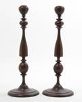 A Pair of Turned Wood Candlesticks